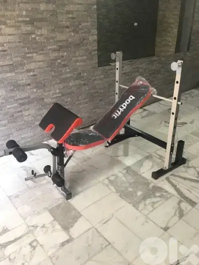 bench adjustable bodyfit new in box with legs and biceps heavy duty
