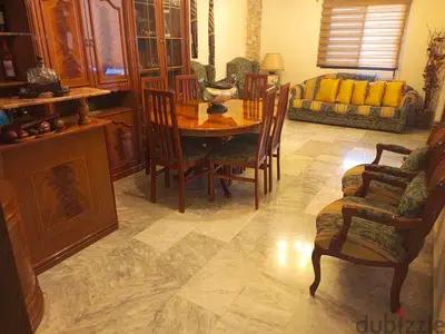 full living room with bar and dining room