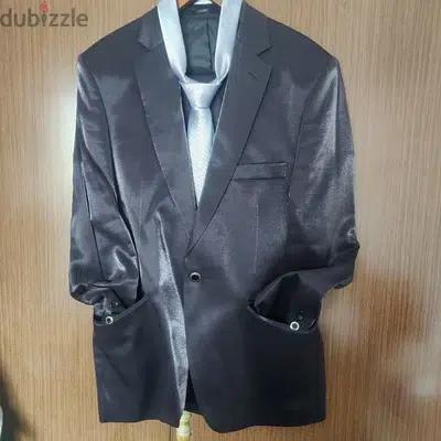 a suit used for one time only with its tie made in turkey ليوم واحد