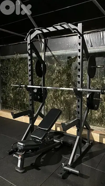 Power rack with life fitness bench
