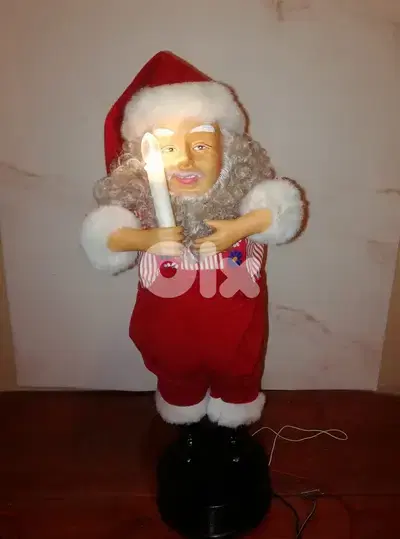 Animated Santa with music & light works on 2 D size batteries size 50