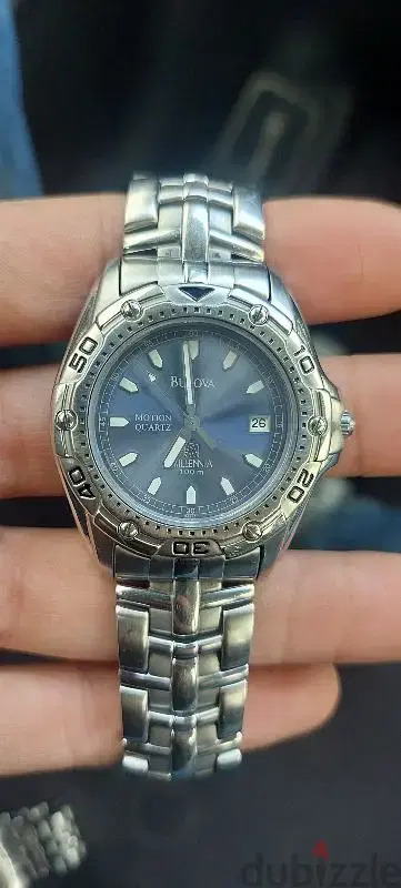 bulova millennia motion quartz