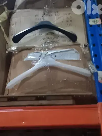 Big qty of plastic and wooden hangers