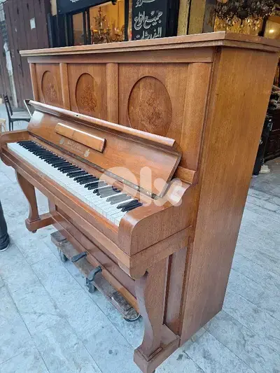 piano made in Germany tuning warranty