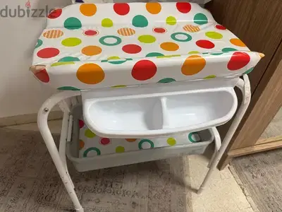 changing table and bath tub