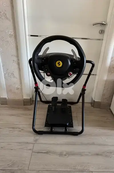 THRUSTMASTER 180 steering wheel + complete metal stand (make ur offer)