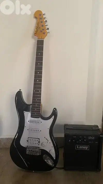 electric guitar with amp