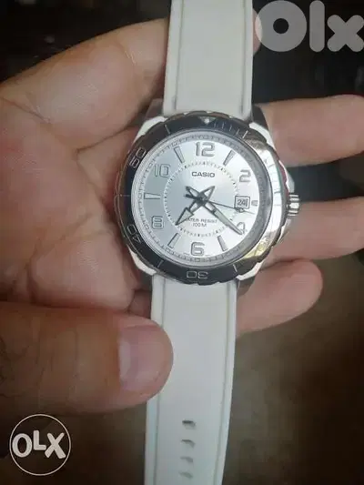 Casio analog white stainless steel.