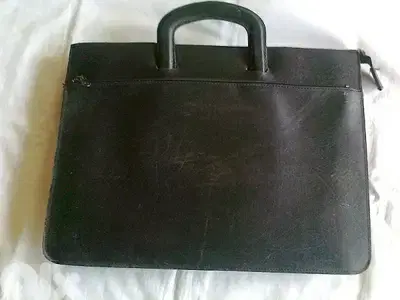 Old leather suitcase - Not Negotiable