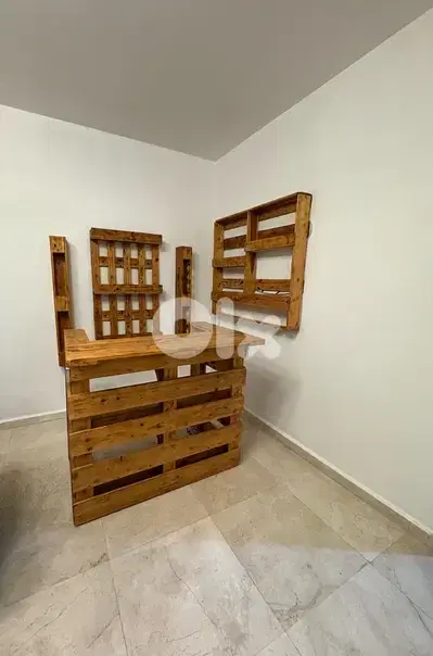 Bar with hanging shelves