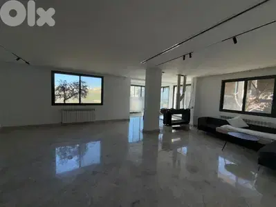 SPACIOUS APARTMENT FOR RENT IN HAZMIEH PRIME WITH TERRACE, (BAR-264)