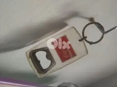 vintage coca cola bottle opener