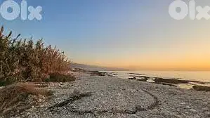 GMK167YA - Beach front land for sale in okaibe - أرض مطلة