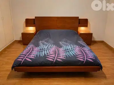 Double bed with storage + 2 nightstands – great condition