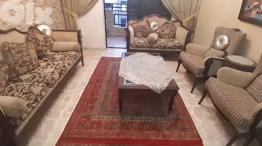 ​ الصالون الفرنسي الكلاسيكي المُطوّر (Louis XV style influence).