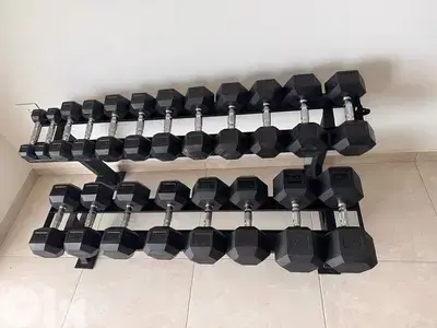 Dumbells and rack and bench