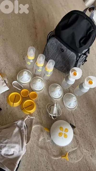 Medela double   - optimal wearable breast pump-  tommee tippee manual