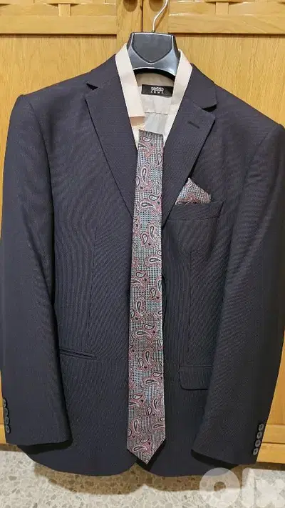 Italian  suit with a shirt and tie