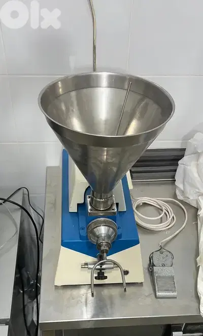 Eclaire, donuts filling machine, مكنة للحشي اكلير ودوناتس