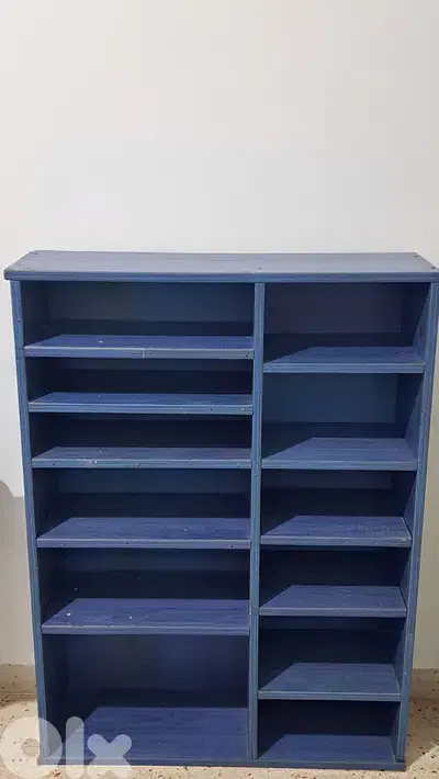 Blue wooden shelving unit