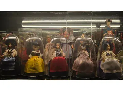 Doll collection handmade with the glass  cabinet