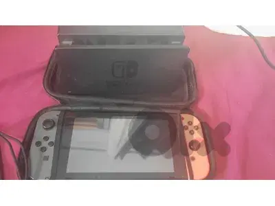 used nintendo switch with 3 games and accessories