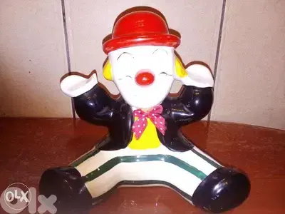 porcelain clown shape money keeper