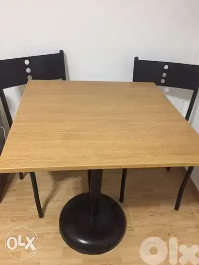Table and 2 chairs. wood and metal. طاولة وكراسي