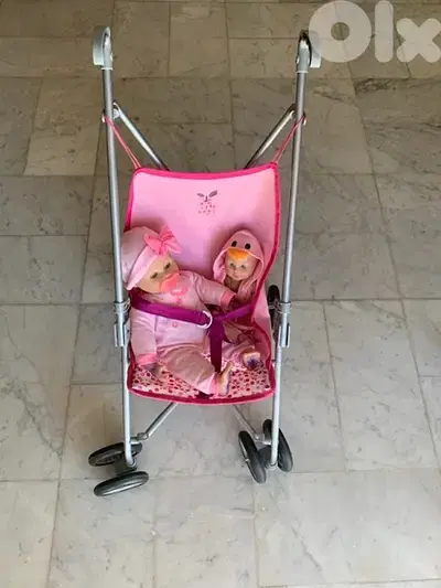 Toy trolley with dolls
