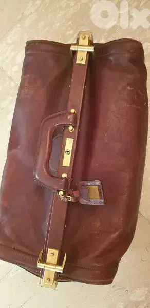 price  reduced antique hand made bag quen leather